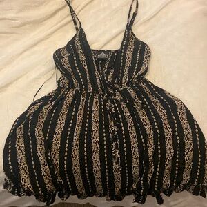 Black boho summer/sun dress. Larger black with floral print